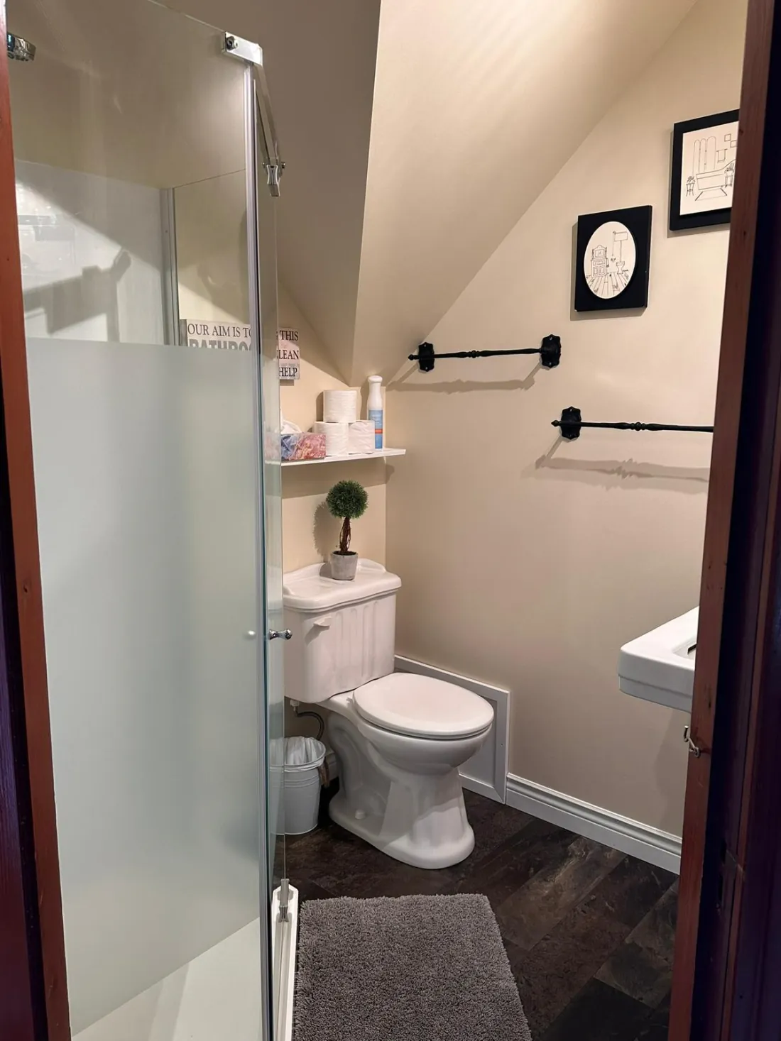 Private bathroom with glass shower for the Trail Room