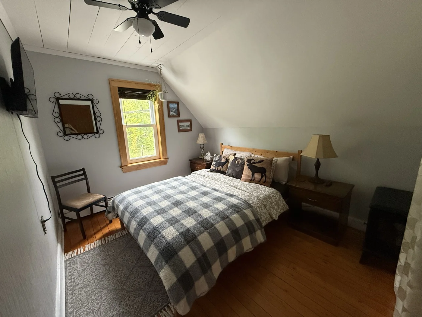The Trail Room, cozy with warm wood floors